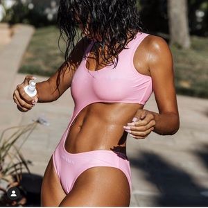 Brand new size small Klein bubble gum swimwear.